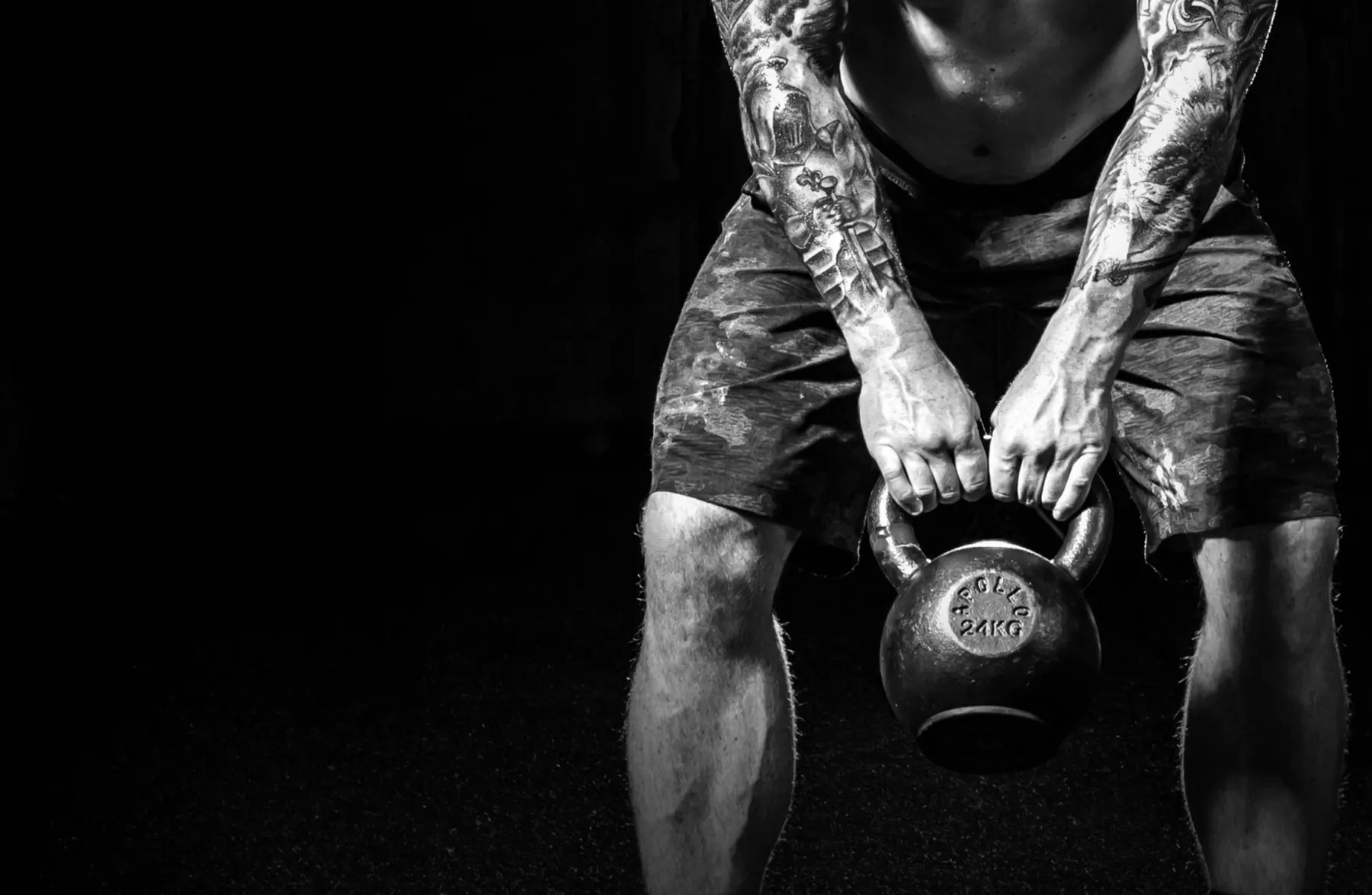 Athlete lifting a kettlebell